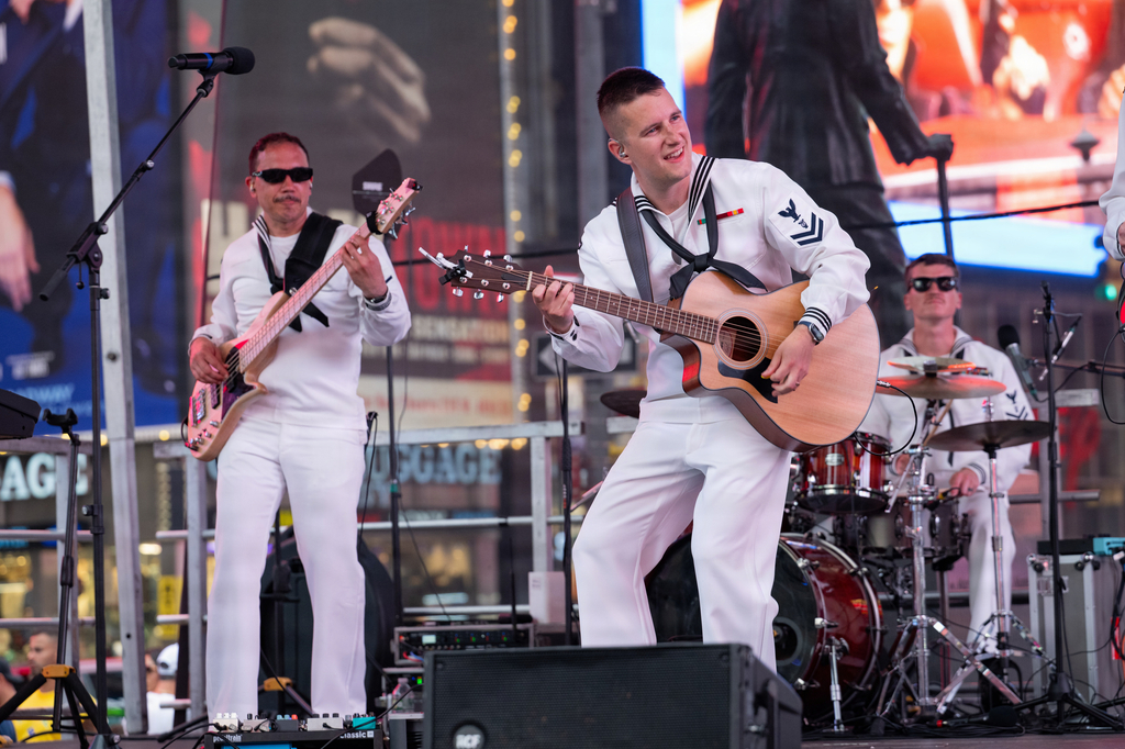 The current image has no alternative text. The file name is: Rhode-Island-Sound-Navy-Band-Northeasts-popular-music-group-performs-in-Times-Square-during-International-Naval-Review-INR-250-July-5-2026-scaled.jpg