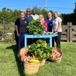 thumbnail_garden ED staff and Darryl and Diane