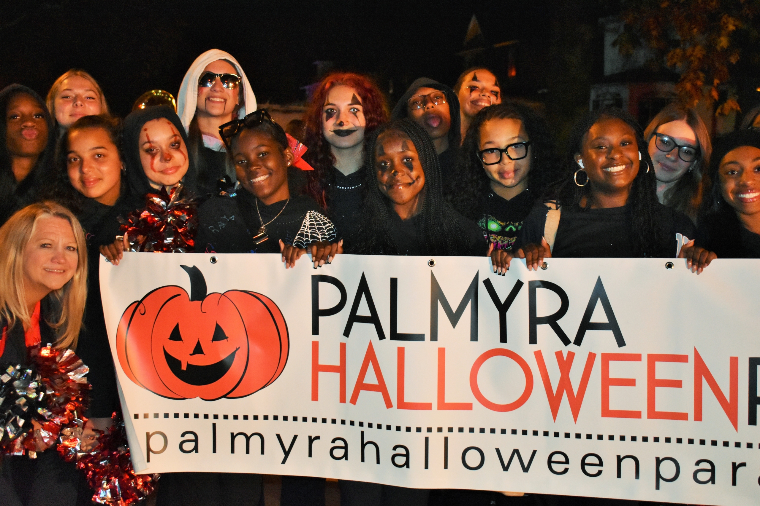 Palmyra High School cheerleaders at Halloween parade